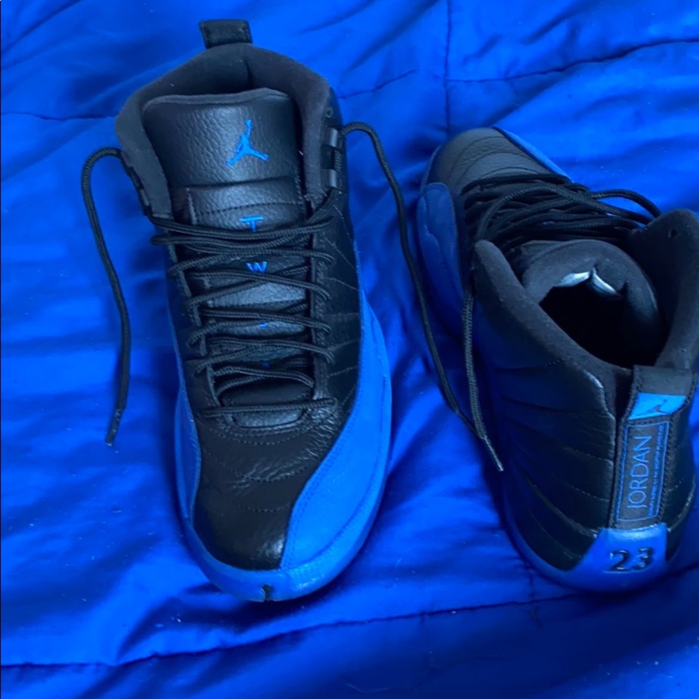 Blue and black Jordan 12s